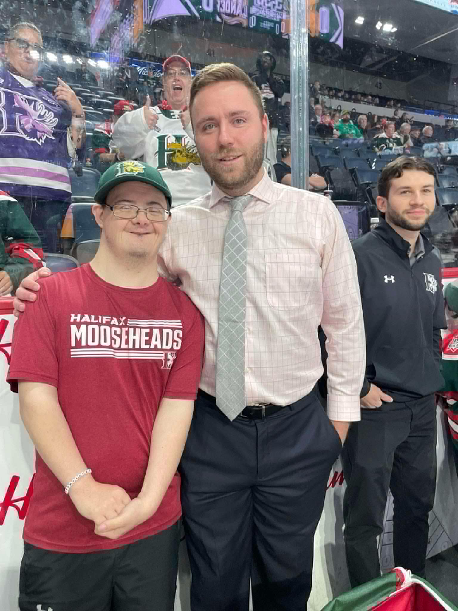 Tyler with a member of the hockey community
